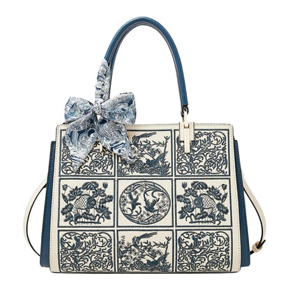 Sylvia™ – Unikalna torebka crossbody z haftem i kokardą