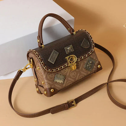 Retro torba na ramię z monogramem i złotymi detalami Zelda™