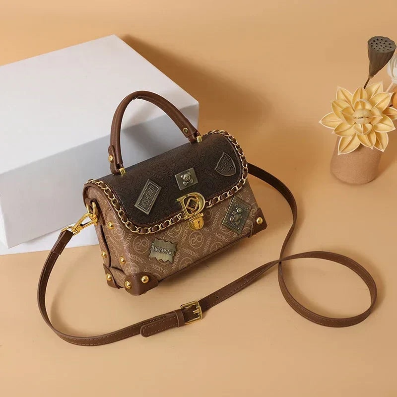 Retro torba na ramię z monogramem i złotymi detalami Zelda™