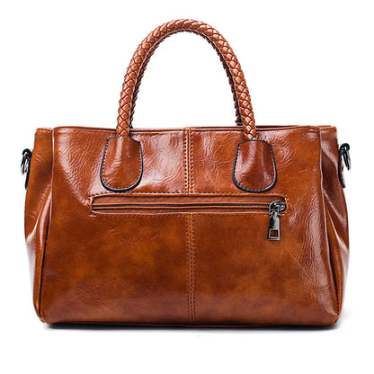 Pia™ | Elegancka skórzana torba z plecionymi uchwytami