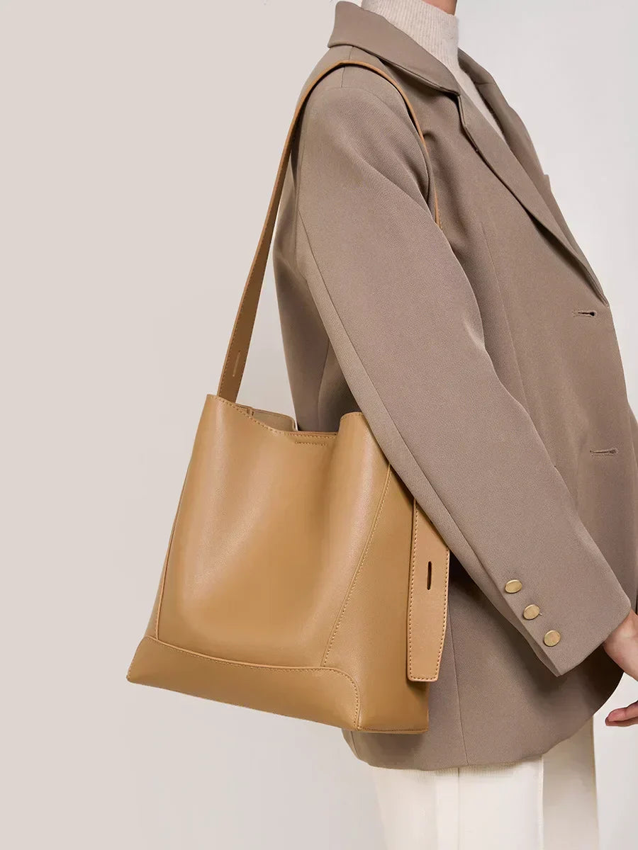 tine™ – Elegancka torebka na ramię w piaskowym odcieniu z uchwytem w formie paska