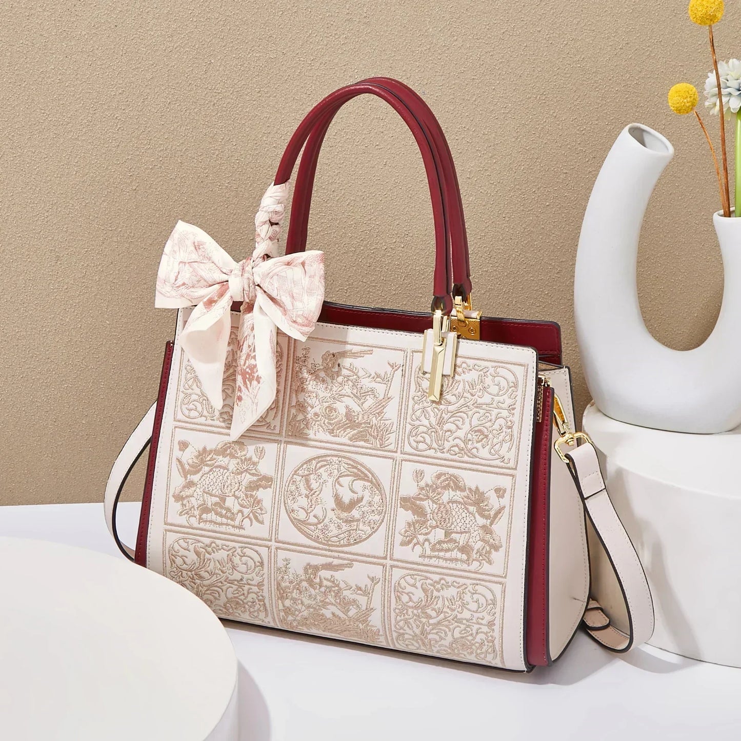 Sylvia™ – Unikalna torebka crossbody z haftem i kokardą