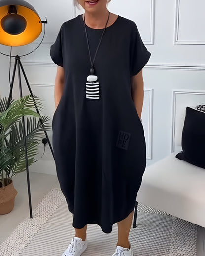 Grażyna | Sukienka midi z unikatowym detalem „HOPE”